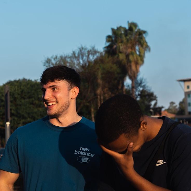 Avery Morgan, Lead Design Curator at Digital Trend Matrix, reviewing corporate floral arrangements